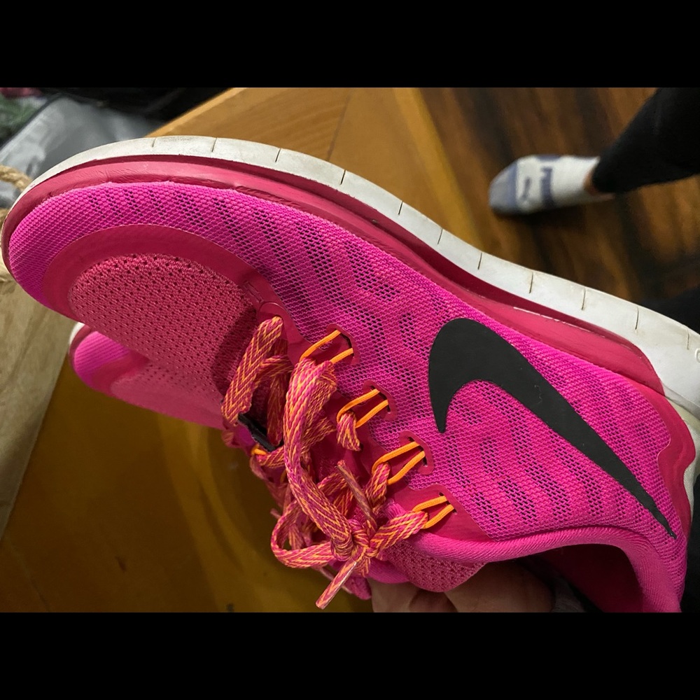 Pink nike running shoes